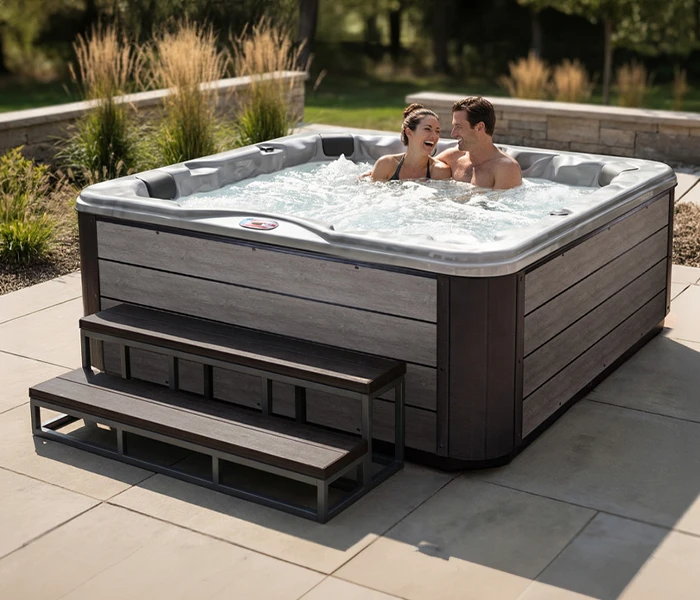 Hot Tubs, Spas, Portable Spas, for sale American Spas American Spas hot tub being used in a family setting